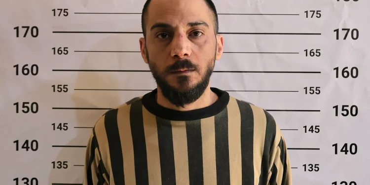 Syria says it arrested ex-intel officer filmed taking part in 2013 Damascus massacre